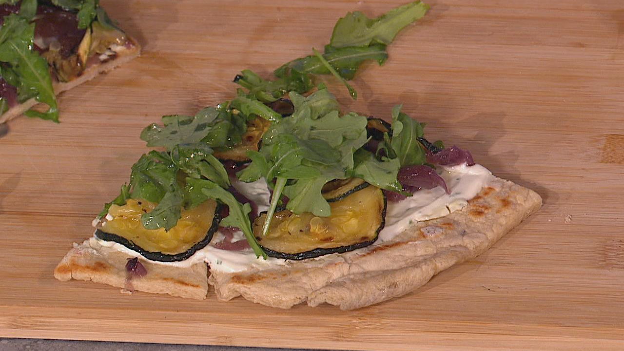 Grilled Turkish Flatbread with onion jam, goats’ cheese, and roast courgettes